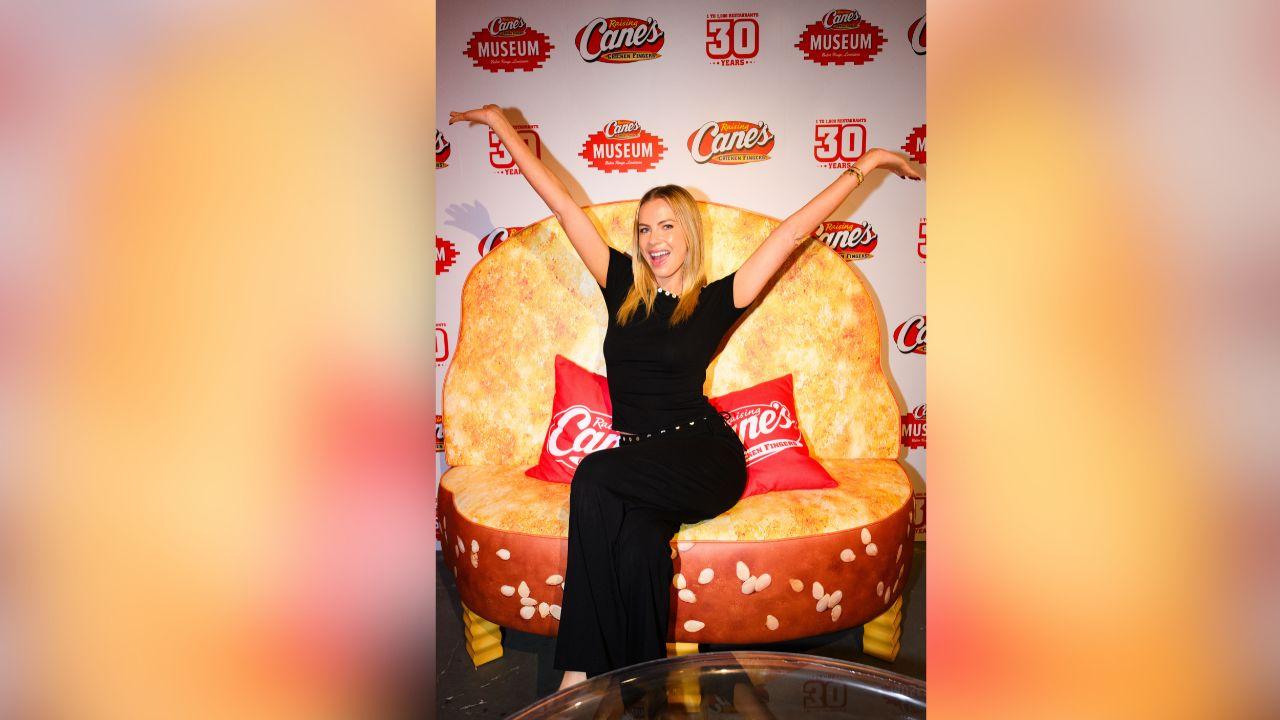 image of Mayci Neeley posed on the Cane’s Toast Couch at the Raising Cane’s 30th Birthday Pop-Up Museum in Baton Rouge on Thursday, October 15, 2026.
