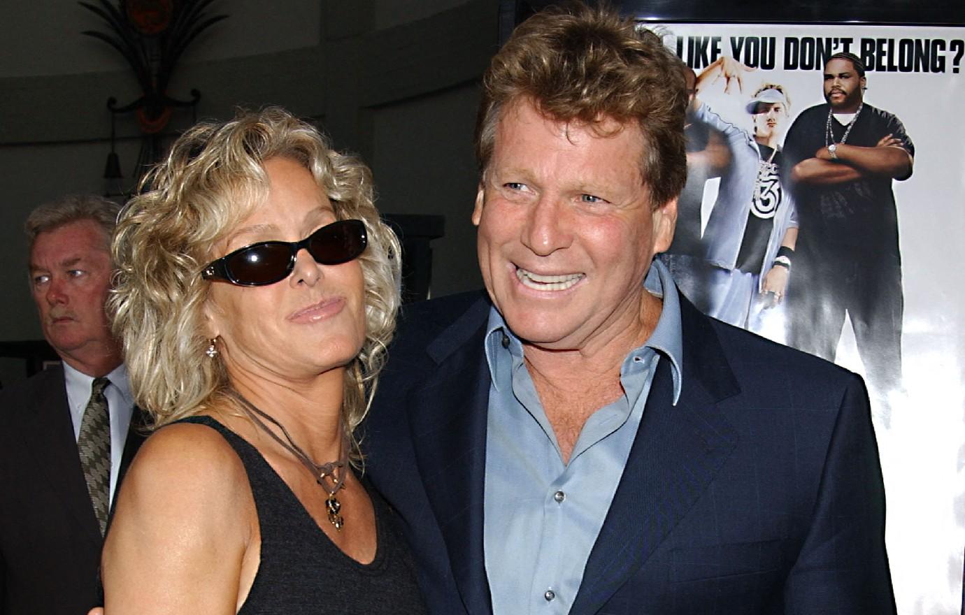 farrah fawcett died arms love of her life ryan oneal pal reveals