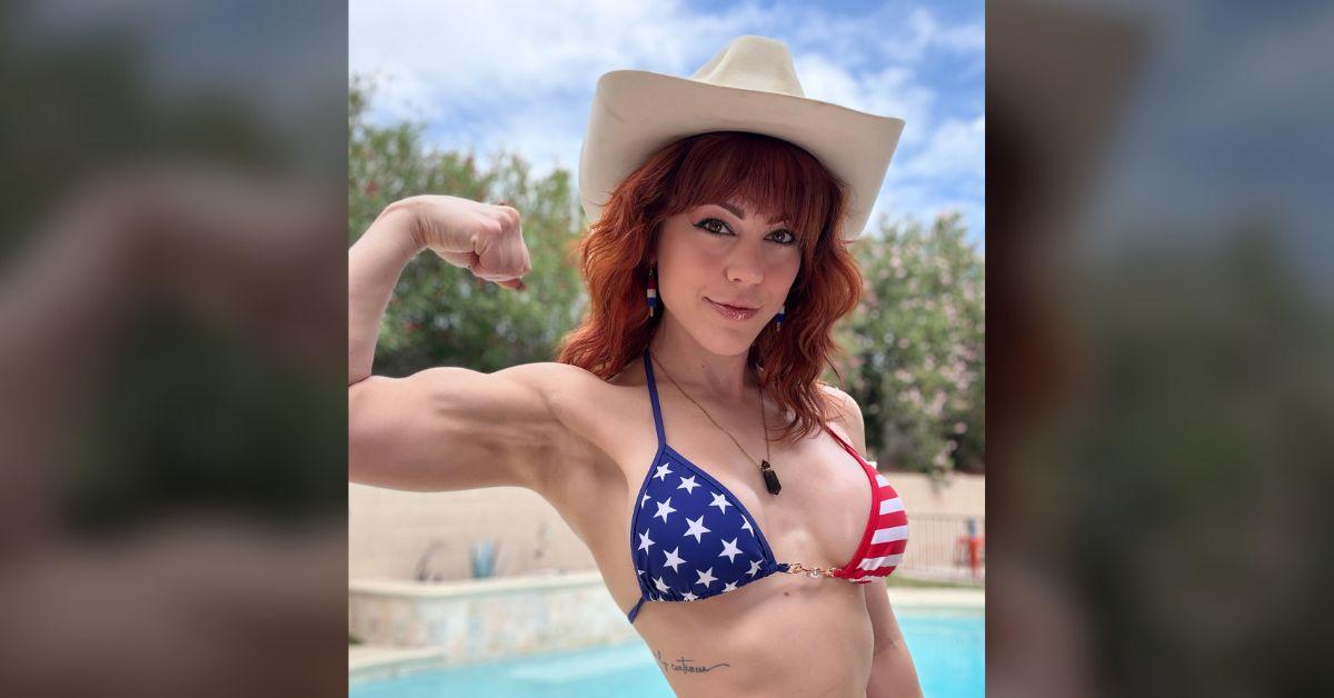 molly stewart posing while flexing