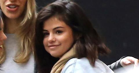 *EXCLUSIVE* Selena Gomez shares a hug with friends outside of church listening to The Weeknd’s “Starboy” **WEB MUST CALL FOR PRICING**