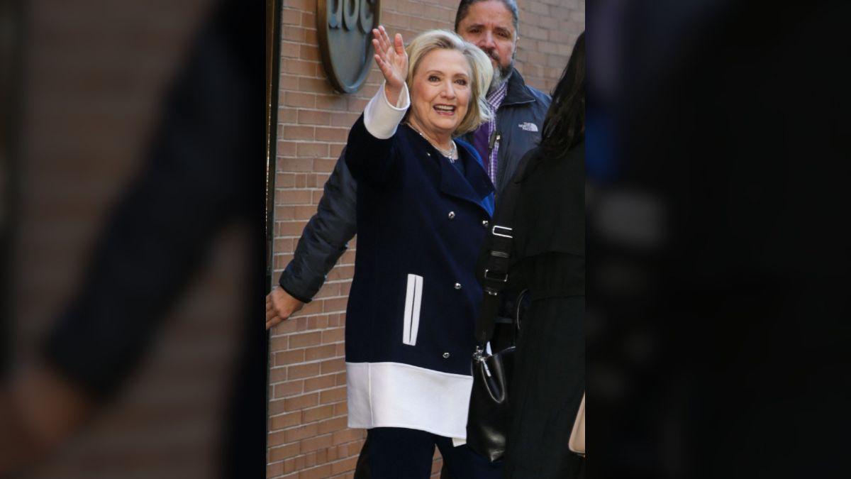 Photo of Hillary Clinton was 'honored' to be alongside Barack and Michelle Obama.