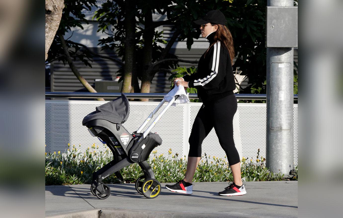 EXCLUSIVE: Eva Longoria arrives back in Australia with baby Santiago