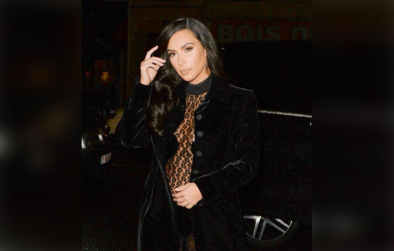 Kim Kardashian Wears a Mesh Bodysuit