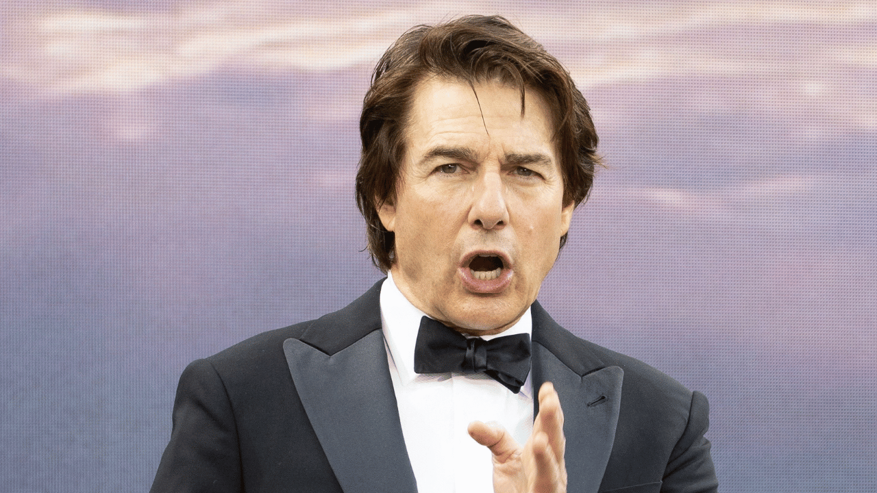 Image of The actor appeared animated while working the carpet, smiling, gesturing and interacting with the crowd gathered for the premiere.