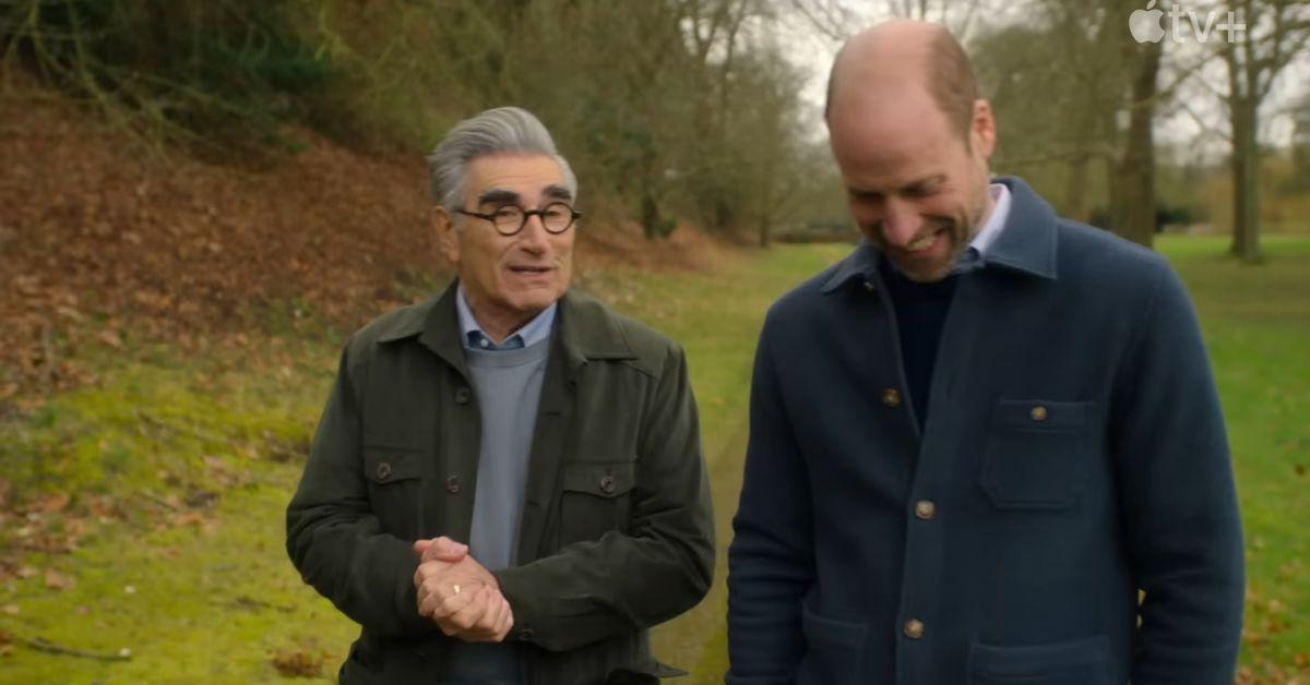 Photo of Prince William and Eugene Levy toured England's Windsor Park. 