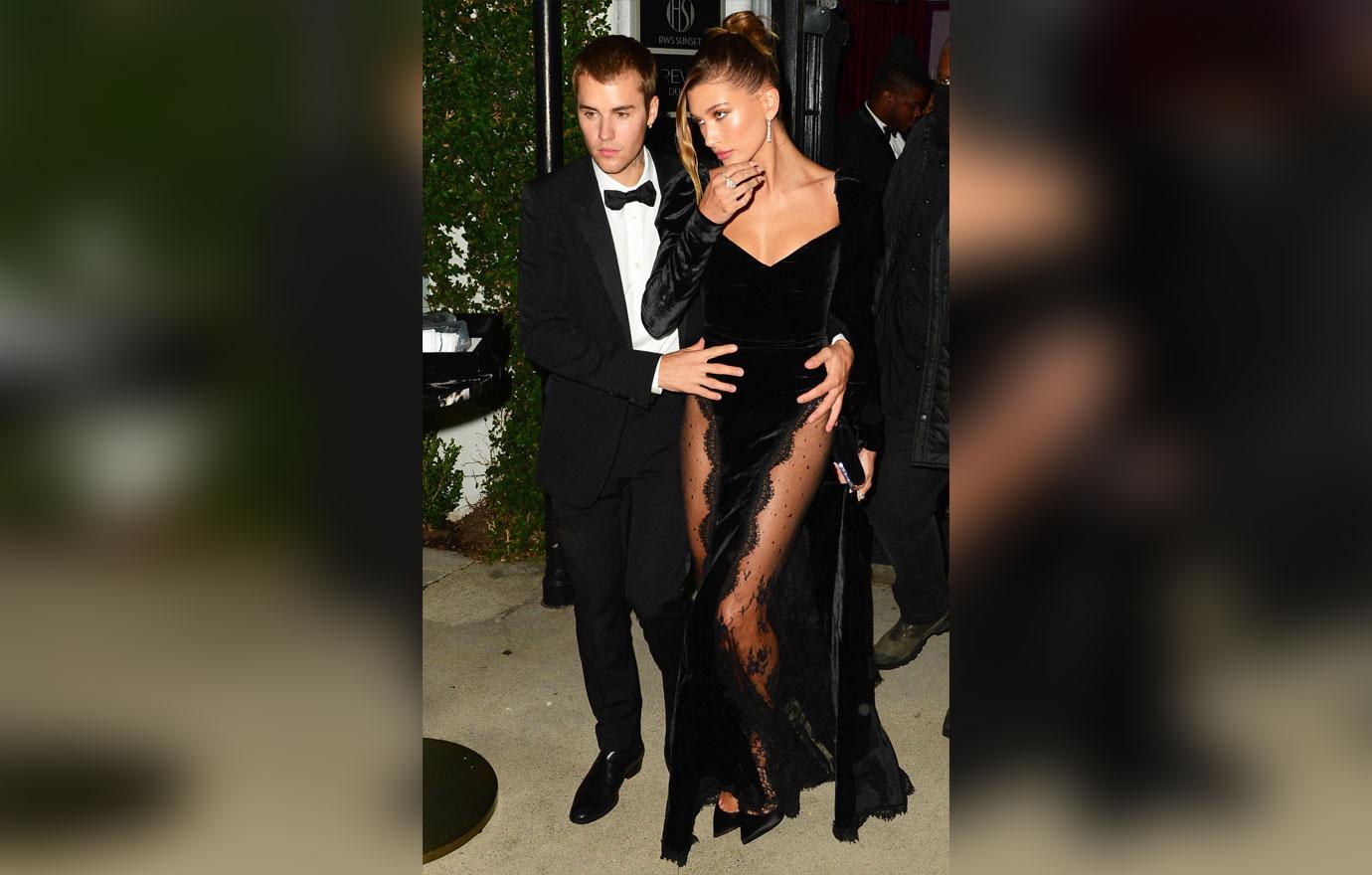 justin bieber and hailey bieber are all dressed up as they attend freedom art experience gallery