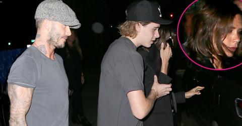 brooklyn beckham helping mom victoria beckham to car
