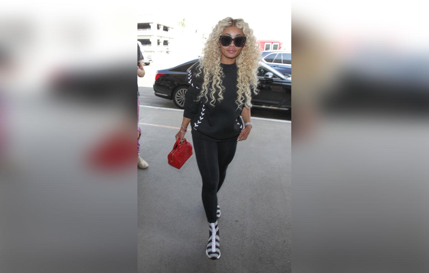 blac chyna with curly blonde hair