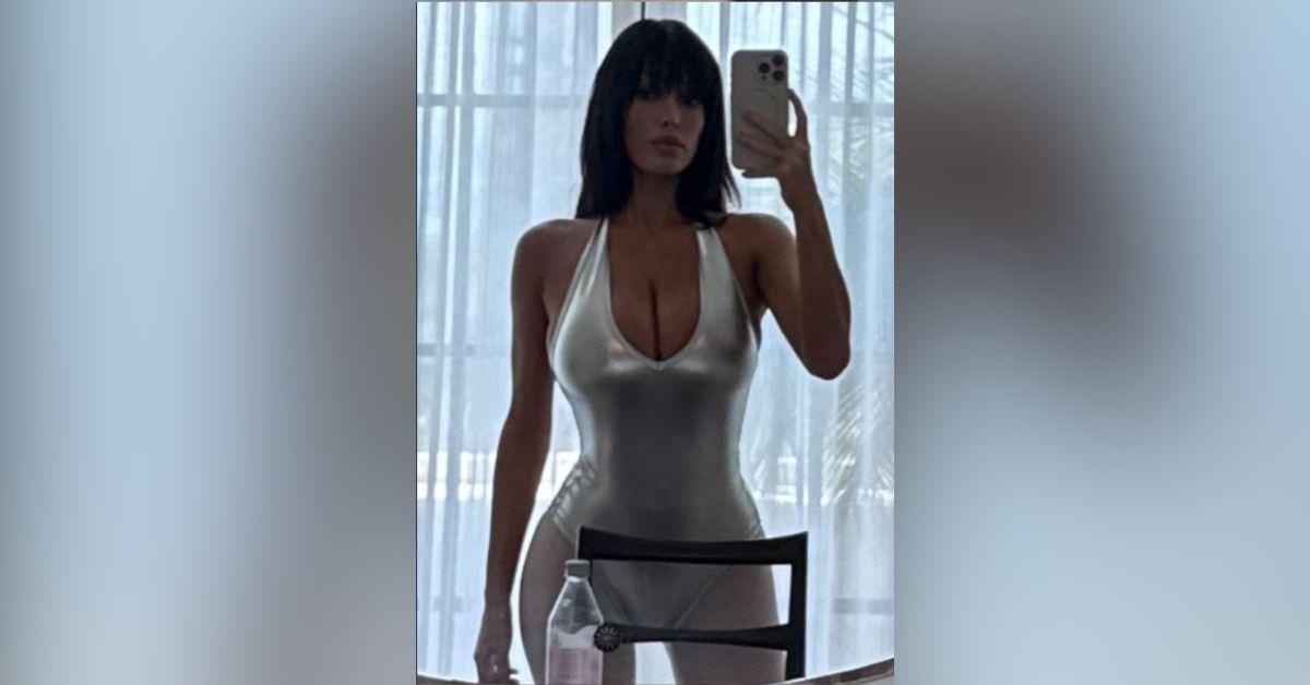 image of fBianca Censori wore a bold silver bodysuit in a new mirror selfie.