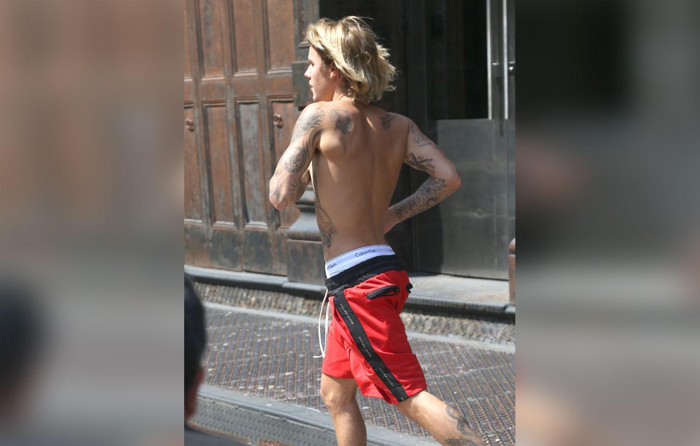 Justin bieber bares chest tattoos shirtless in NYC 6