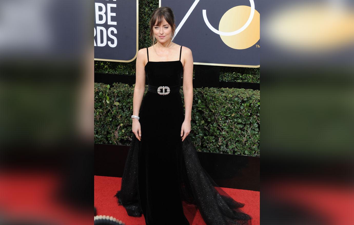 dakota johnson black dress on red carpet