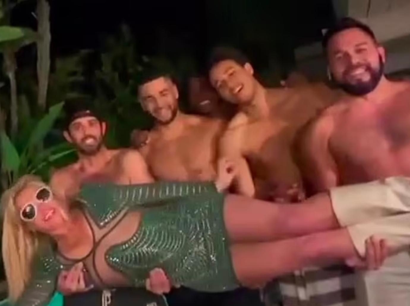 britney spears male friend licks leg sam asghari