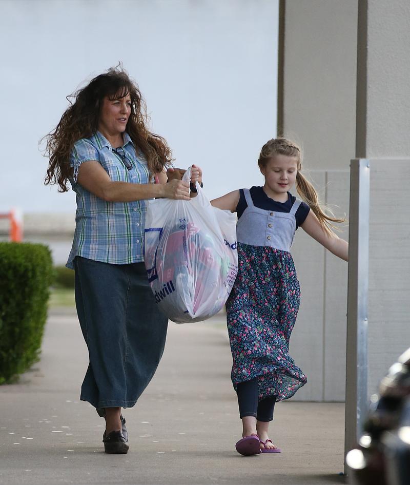 EXCLUSIVE: ** PREMIUM EXCLUSIVE RATES APPLY**  Michelle Duggar runs errands with Jennifer Danielle