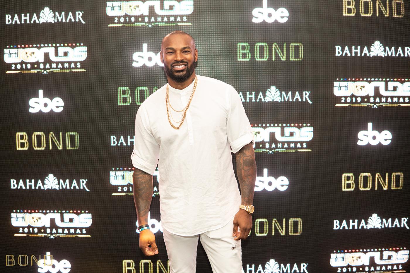 Tyson Beckford in All White Ensemble Smiling