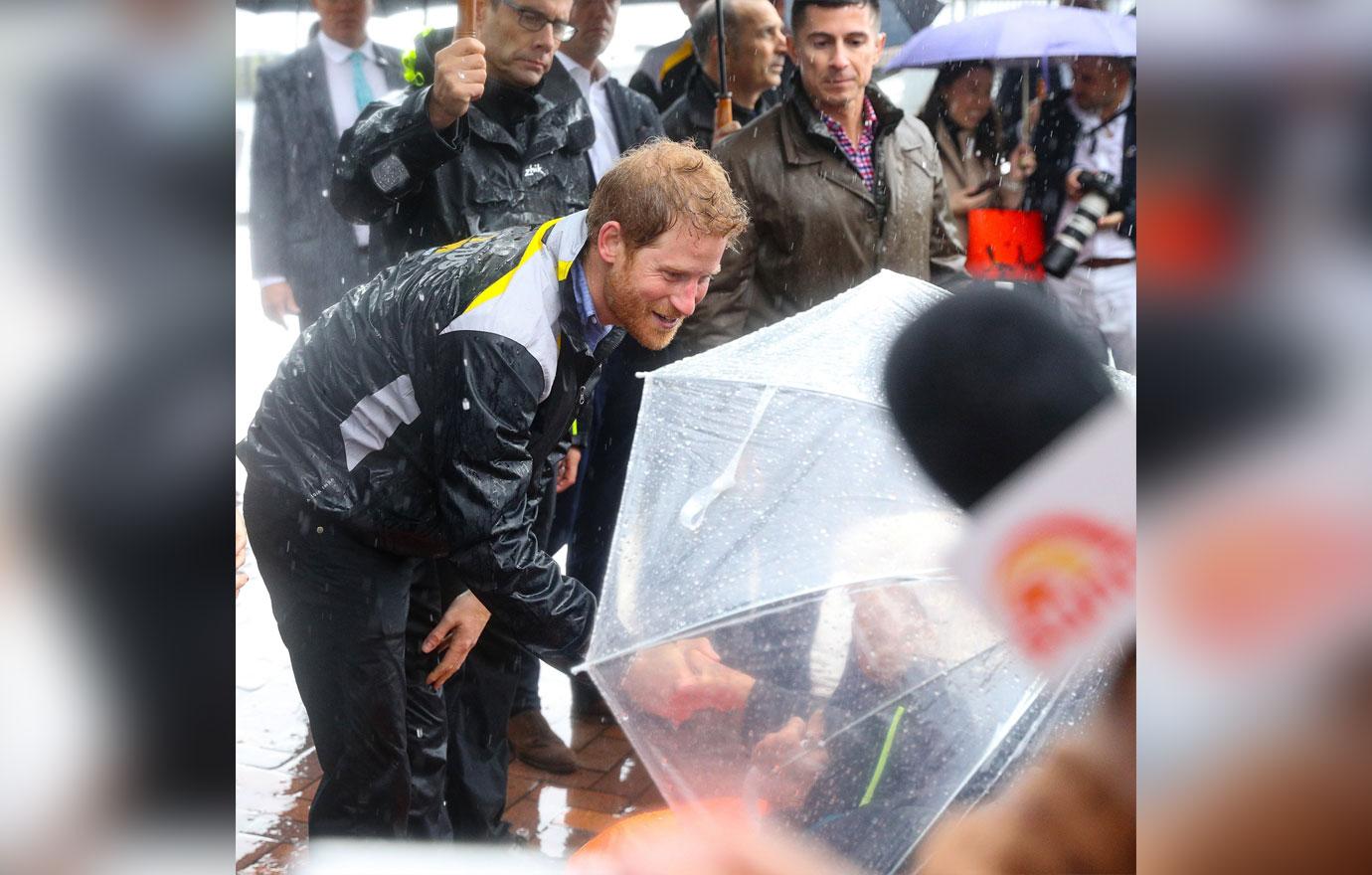 Prince Harry Australia Visit Rain Photos 06