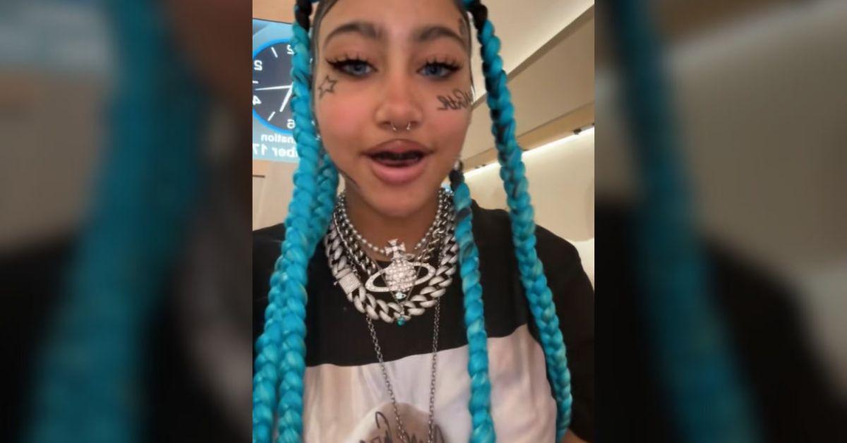 image of North West surprised fans with her face and hands covered in fake tattoos and piercings.