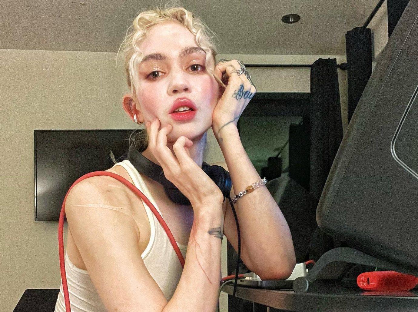 grimes became less gay interested dating girls after welcoming  kids elon musk