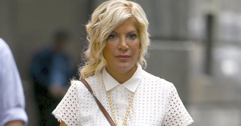 Tori Spelling Poses With Mickey Mouse In NYC