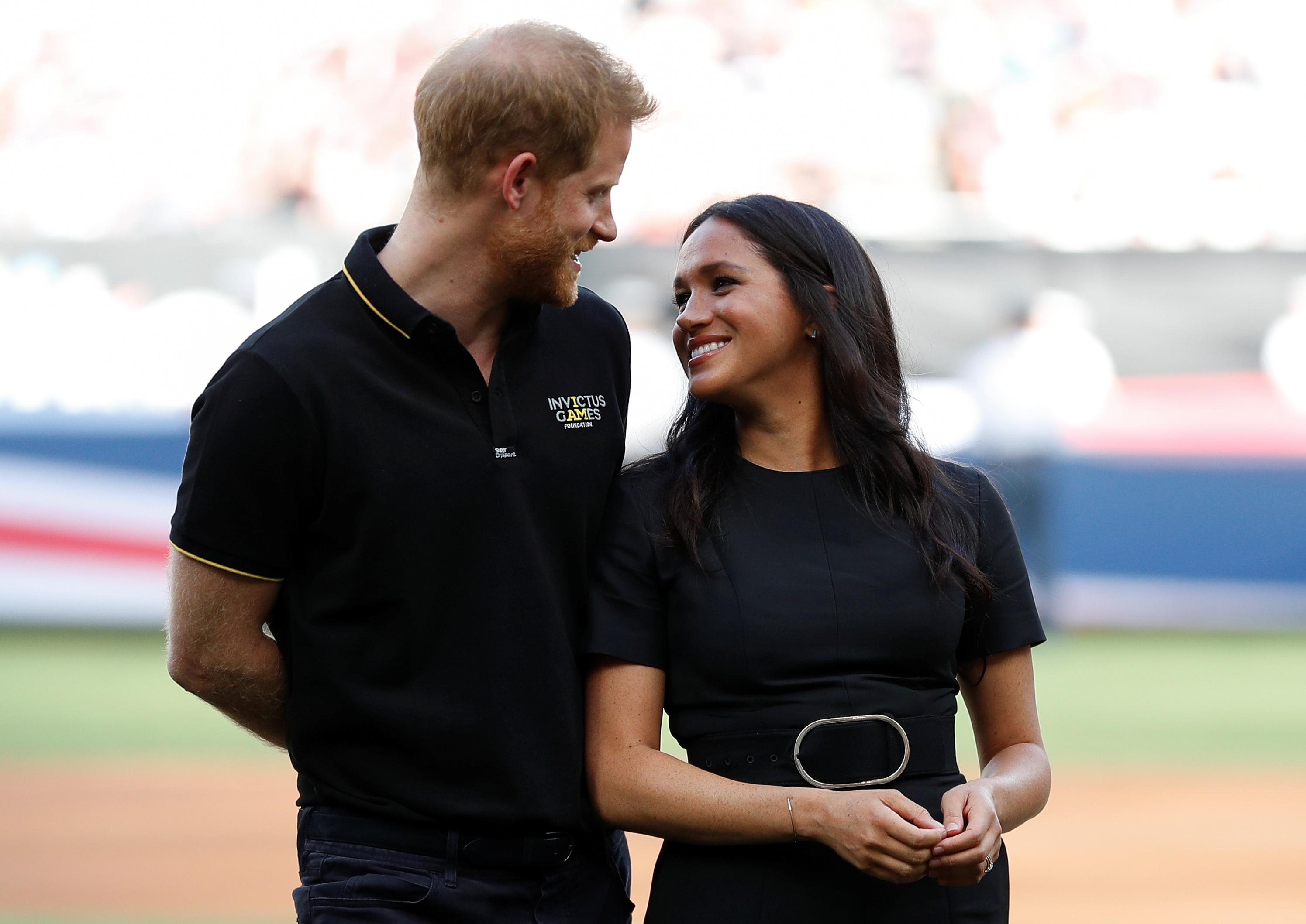 Meghan Markle & Prince Harry Make Appearance At Historic MLB Game