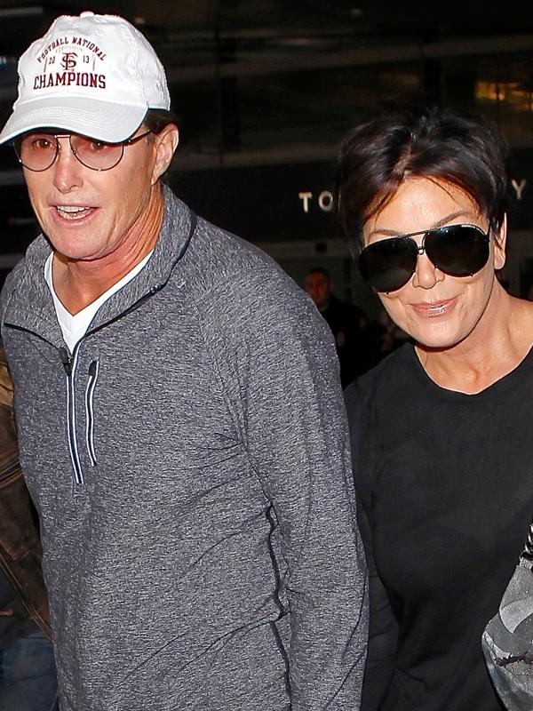 Kris and Bruce Jenner hold hands at LAX