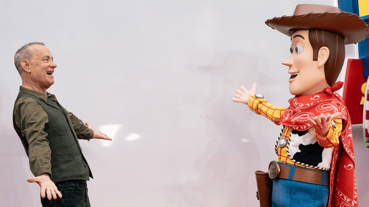 Photo of Tom Hanks and Woody from 'Toy Story 5'