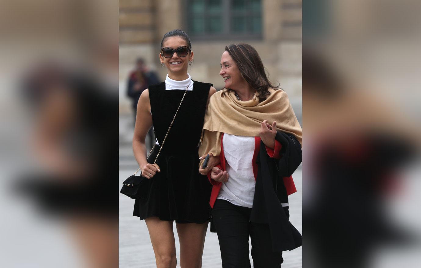 Nina Dobrev and her mother strolling in Paris