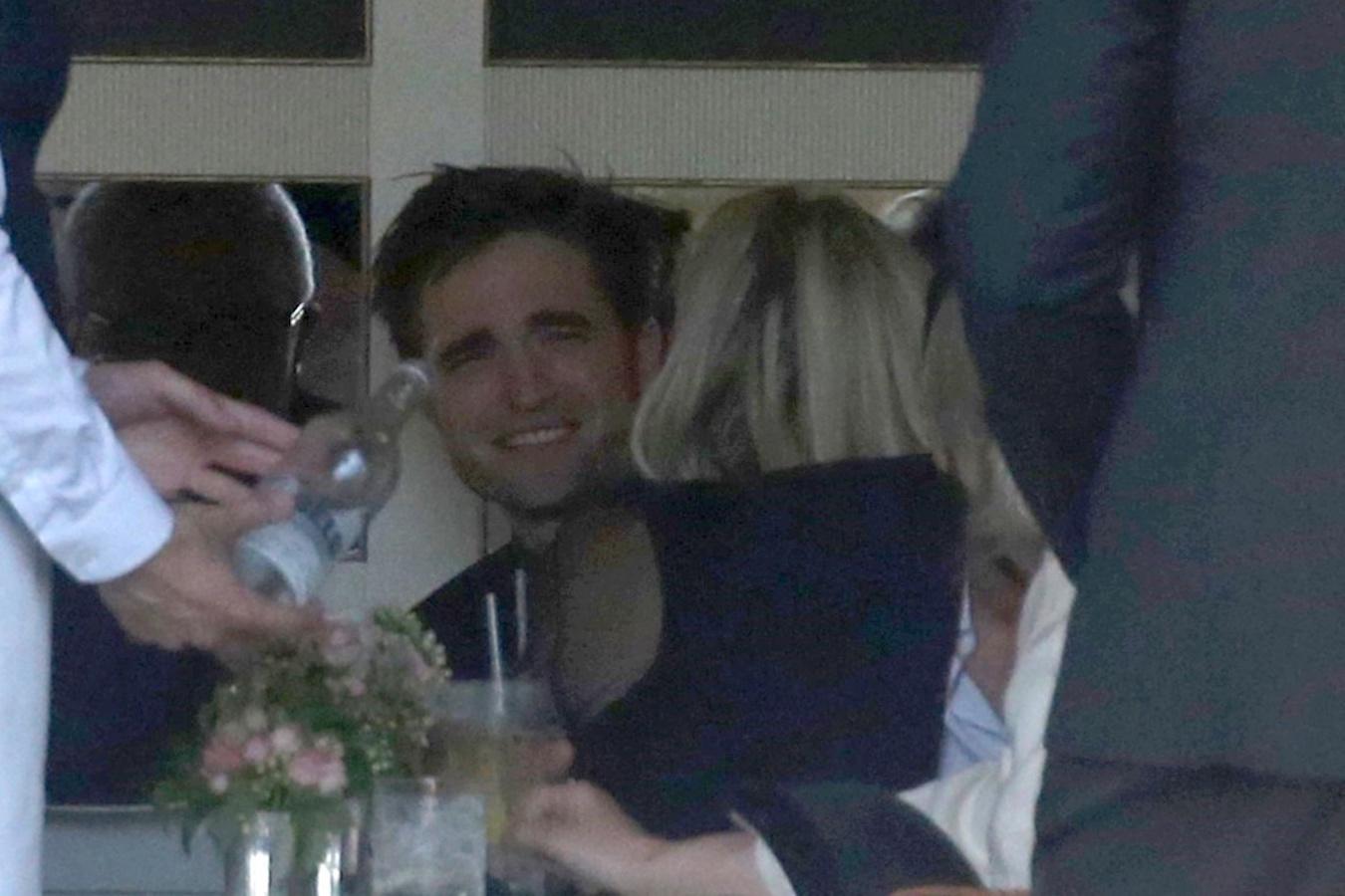 *EXCLUSIVE* Rob Pattinson gets flirty with a mystery blonde