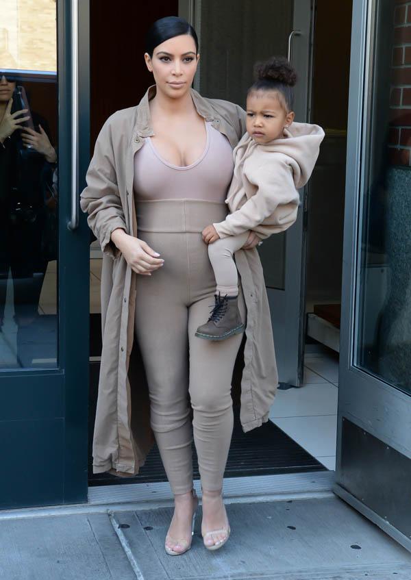 Kim Kardashian and North West on there way to kanye west fashion show