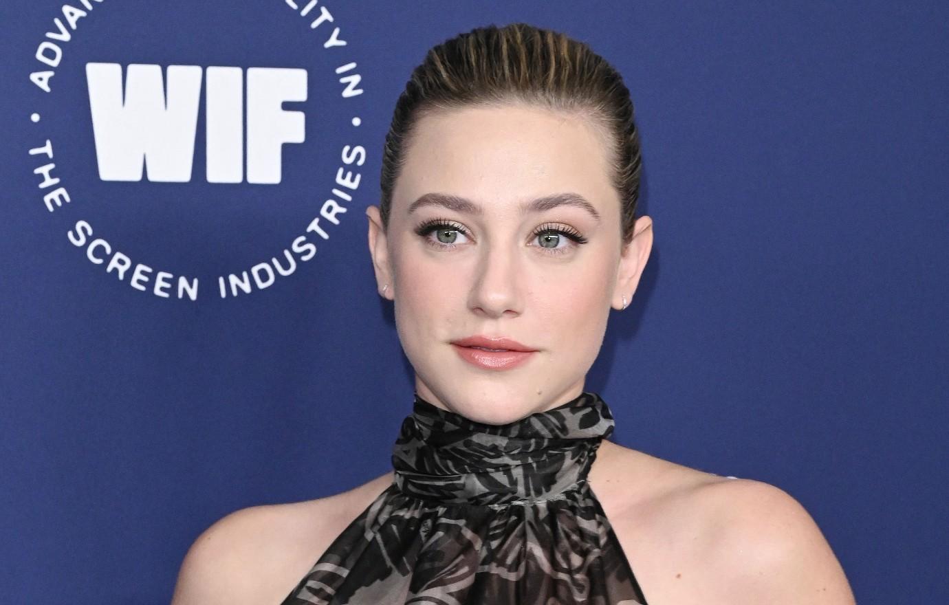 Lili Reinhart puts a sultry display as she flashes her cleavage on