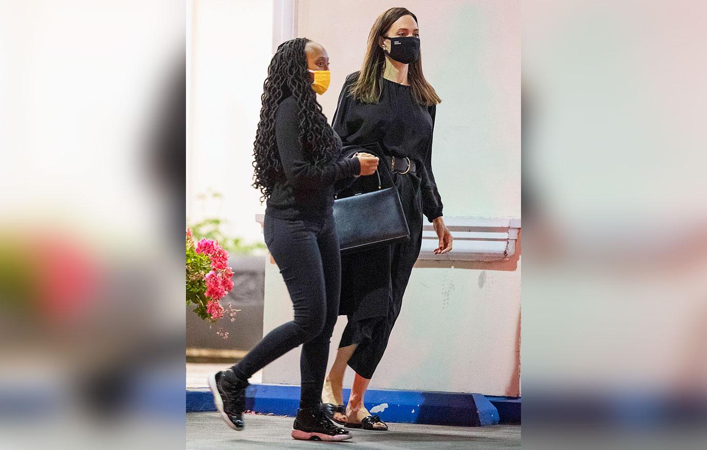 angelina jolie leaves her favorite sushi spot with zahara and pax