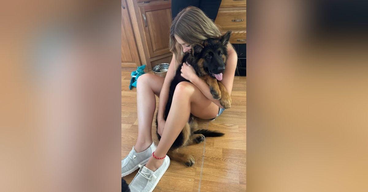 image of Sydney Sweeney spent time at the lake with her dog.