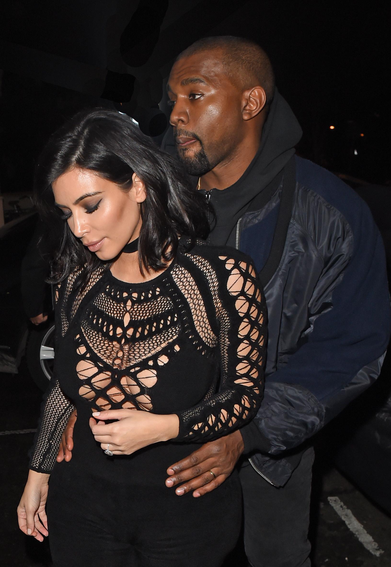 INF &#8211; Kanye West Wraps His Arms Around Kim Kardashian As They Are Spotted After The BRIT Awards 2015