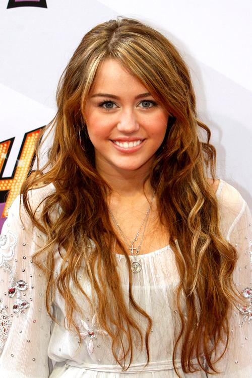 Miley Cyrus as Hannah Montana