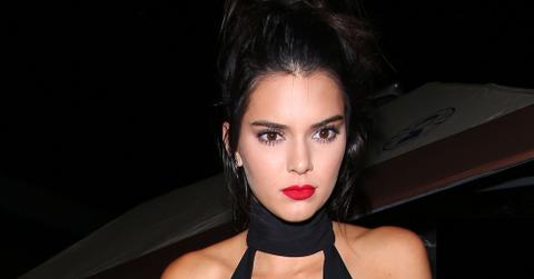 Kendall Jenner wears a plunging black jumpsuit to her 20th birthday party