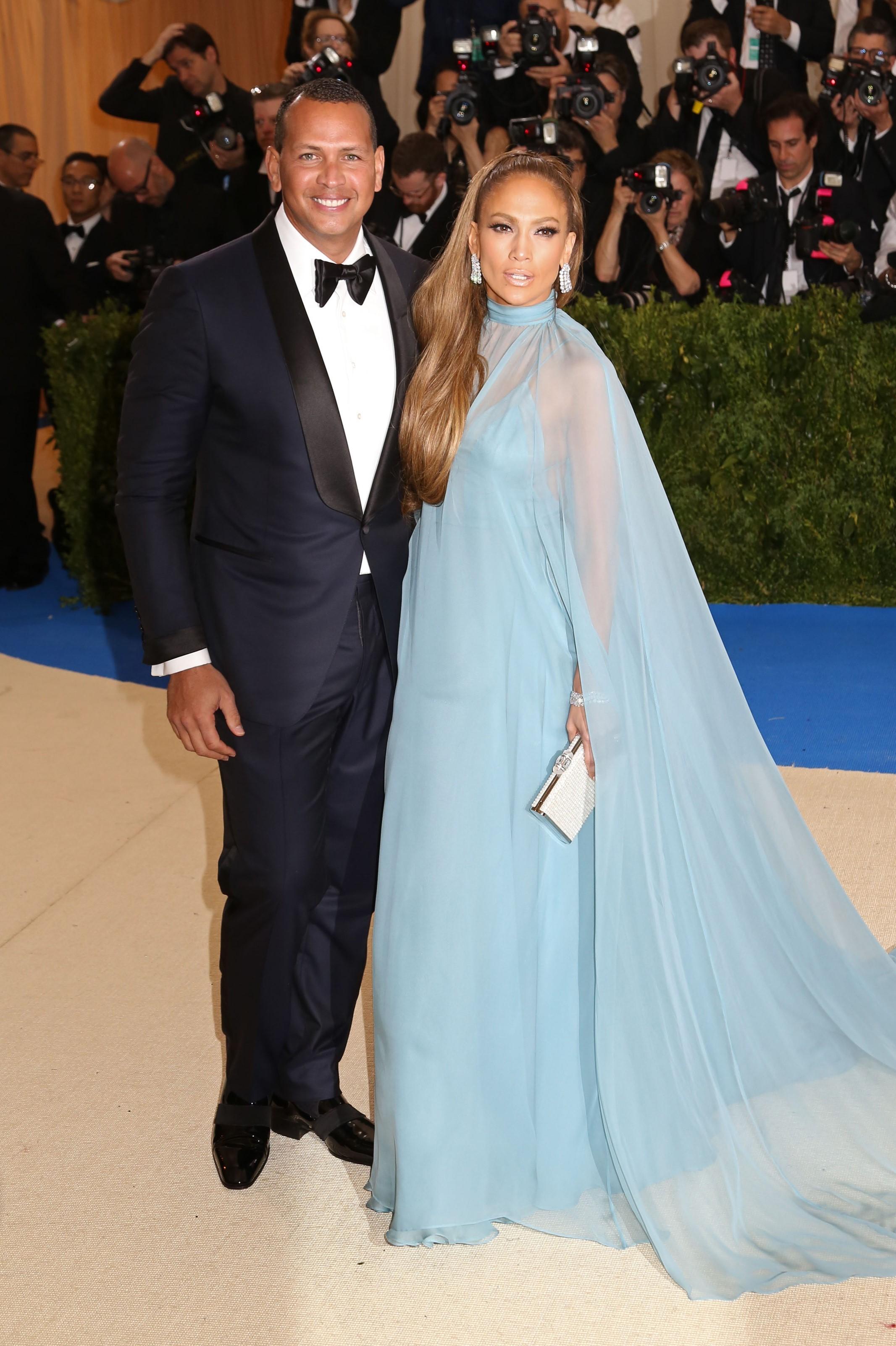 Alex Rodriguez and Jennifer Lopez pose together at the 2017 Met Gala