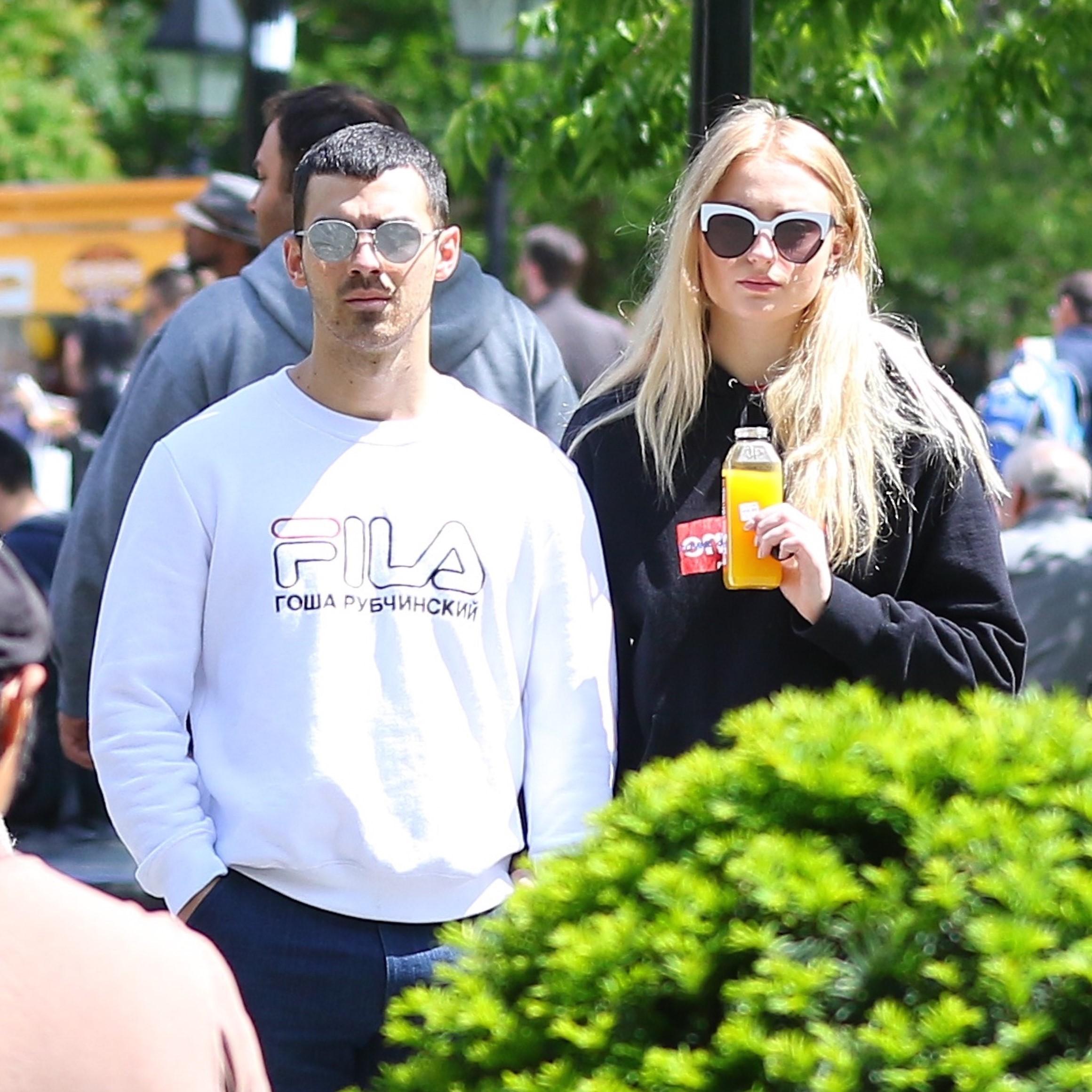 *EXCLUSIVE* Joe Jonas and Sophie Turner enjoy the talent and share some PDA