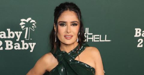 salma hayeks family sprays water bikini photo peace