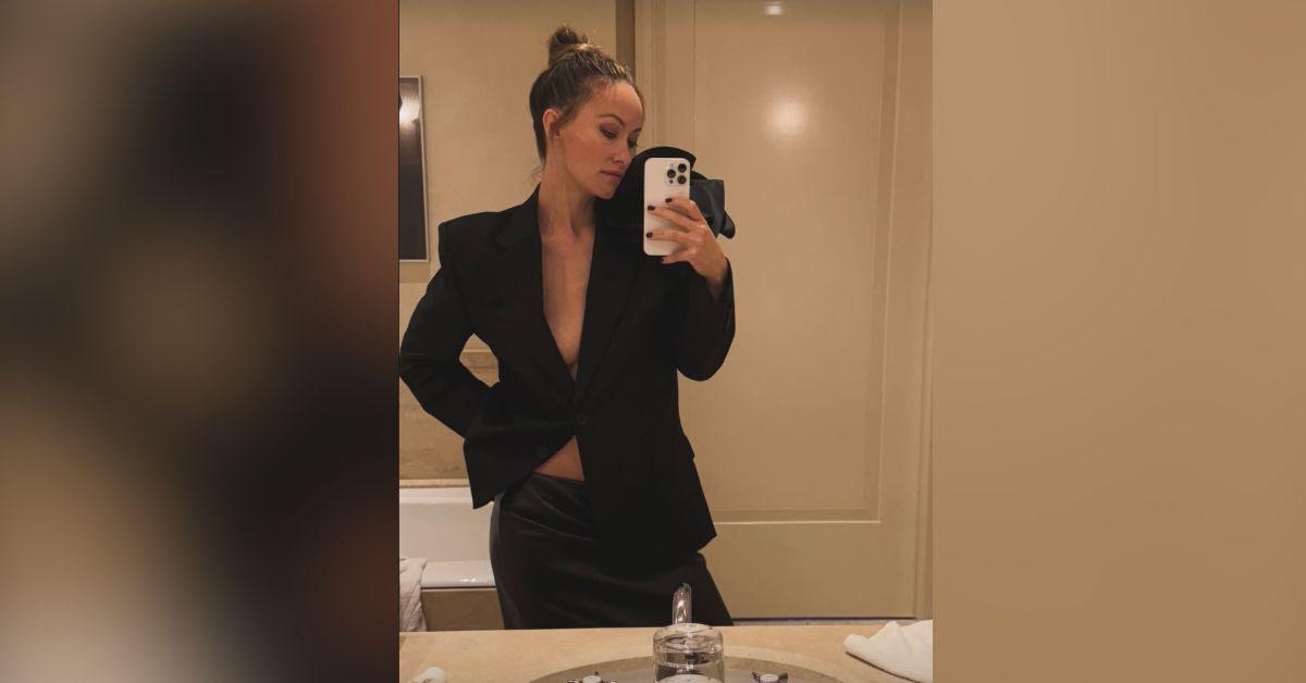 image of Olivia Wilde wore a black blazer sans bra. 