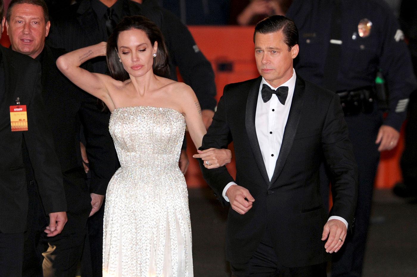 Brad Pitt dresses Old Hollywood with wife Angelina displaying a curvy figure at By The Sea Premiere in LA