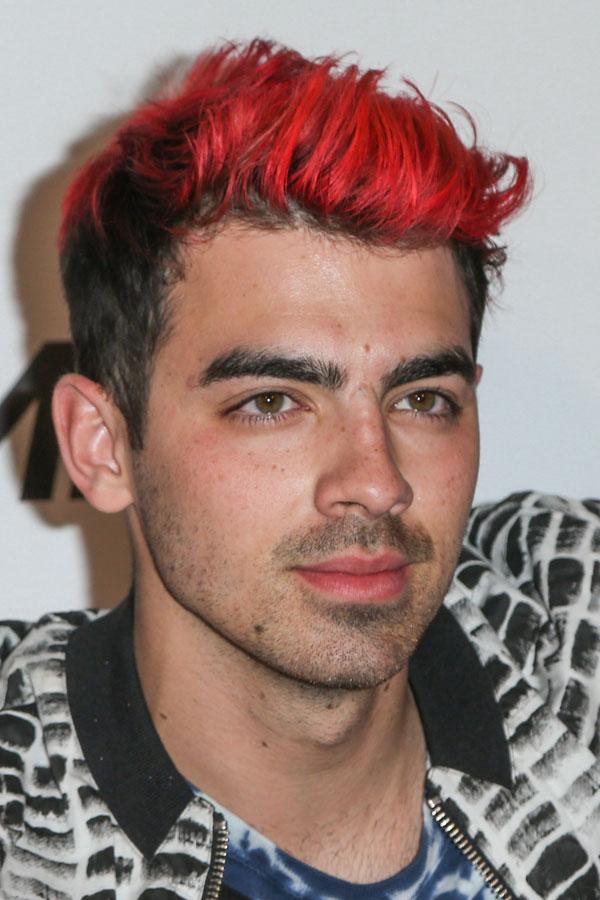 joe jonas frowns looks sad blocked ocars after party