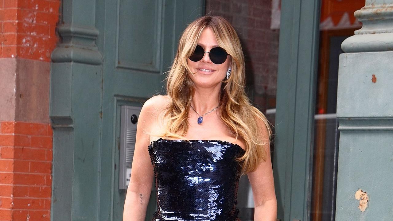 Image of Heidi Klum ditched her bikini top while on vacation with her husband, Tom Kaulitz.