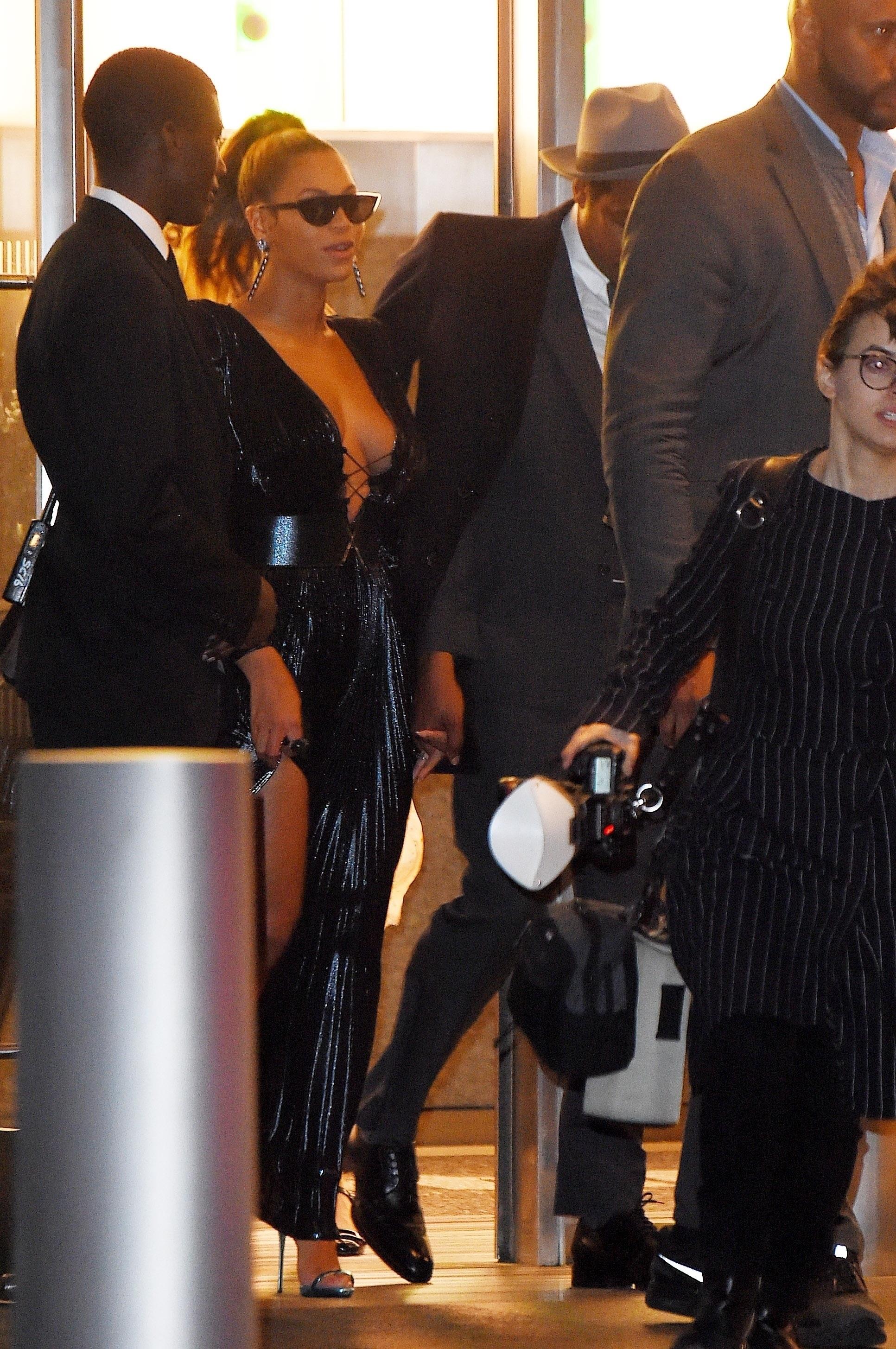 Beyonce and Jay Z hold hands as they leave Roc Nation brunch