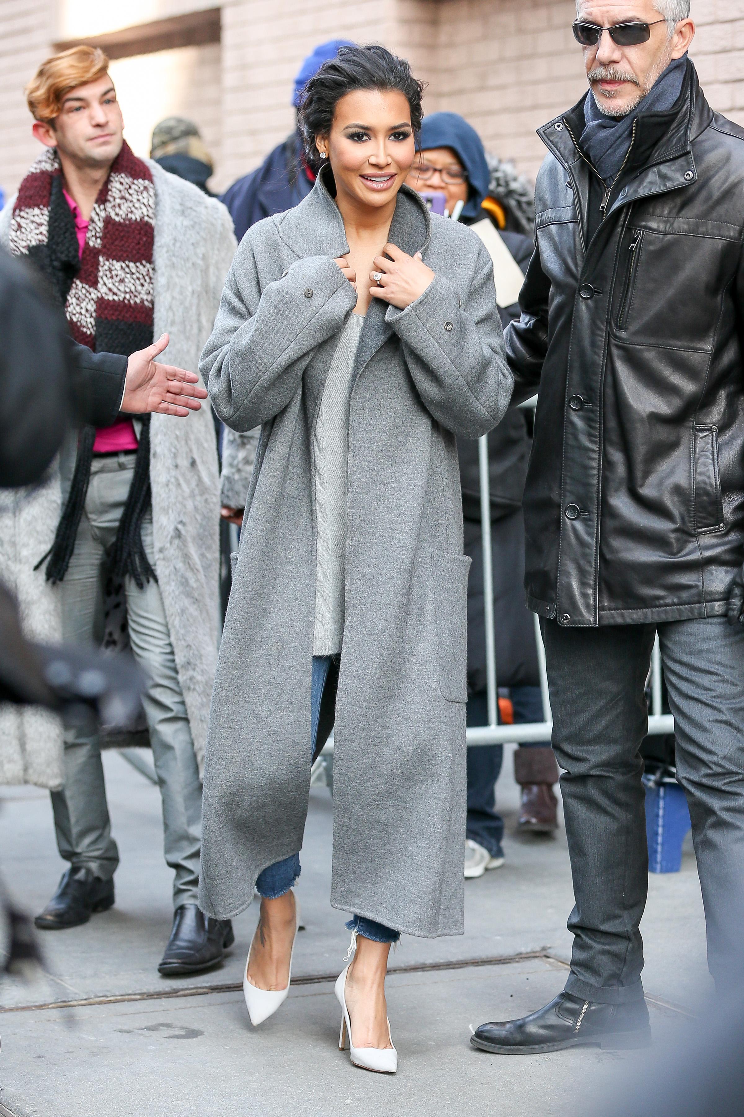 Naya Rivera wears a long grey coat while leaving &#8216;The View&#8217; in New York City