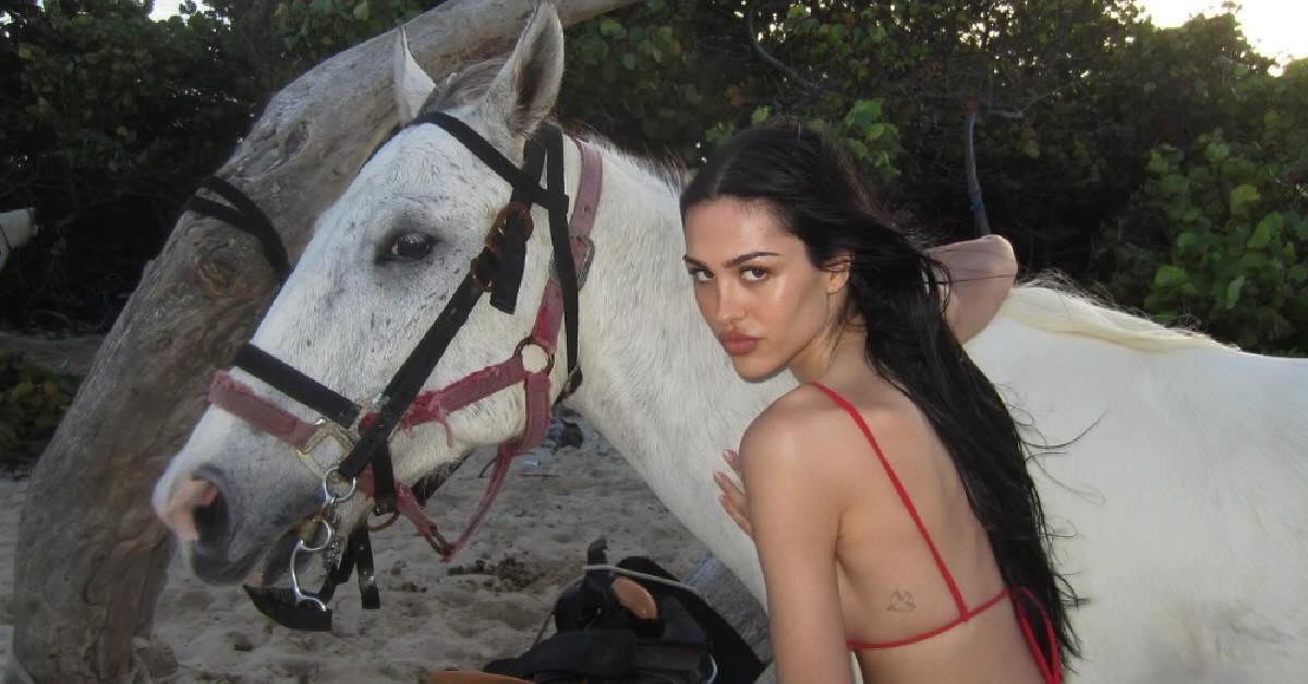 amelia gray rocks skimpy red bikini beach photoshoot horse