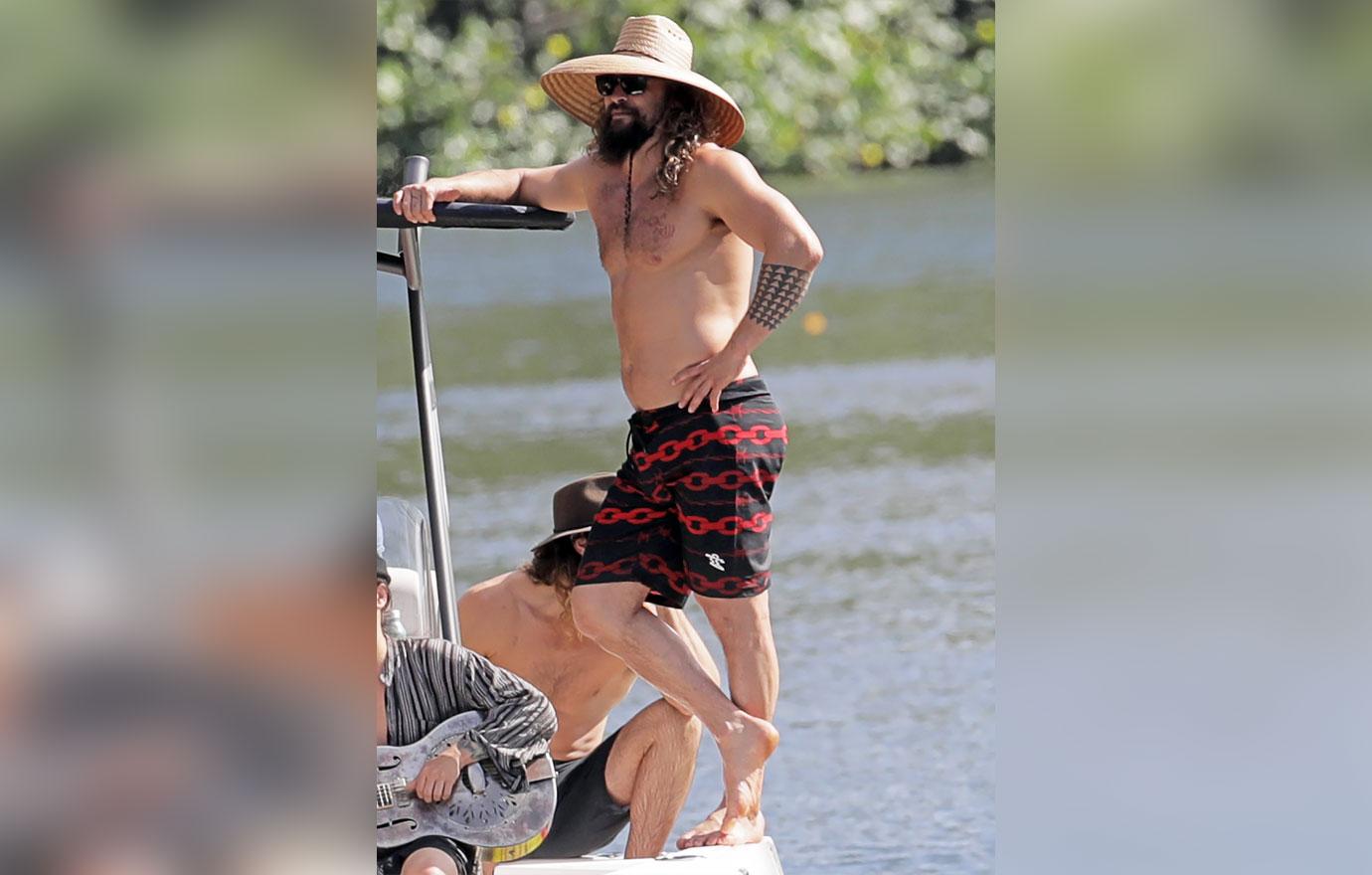 jason momoa shows off his glistening muscles boat trip hawaii ok