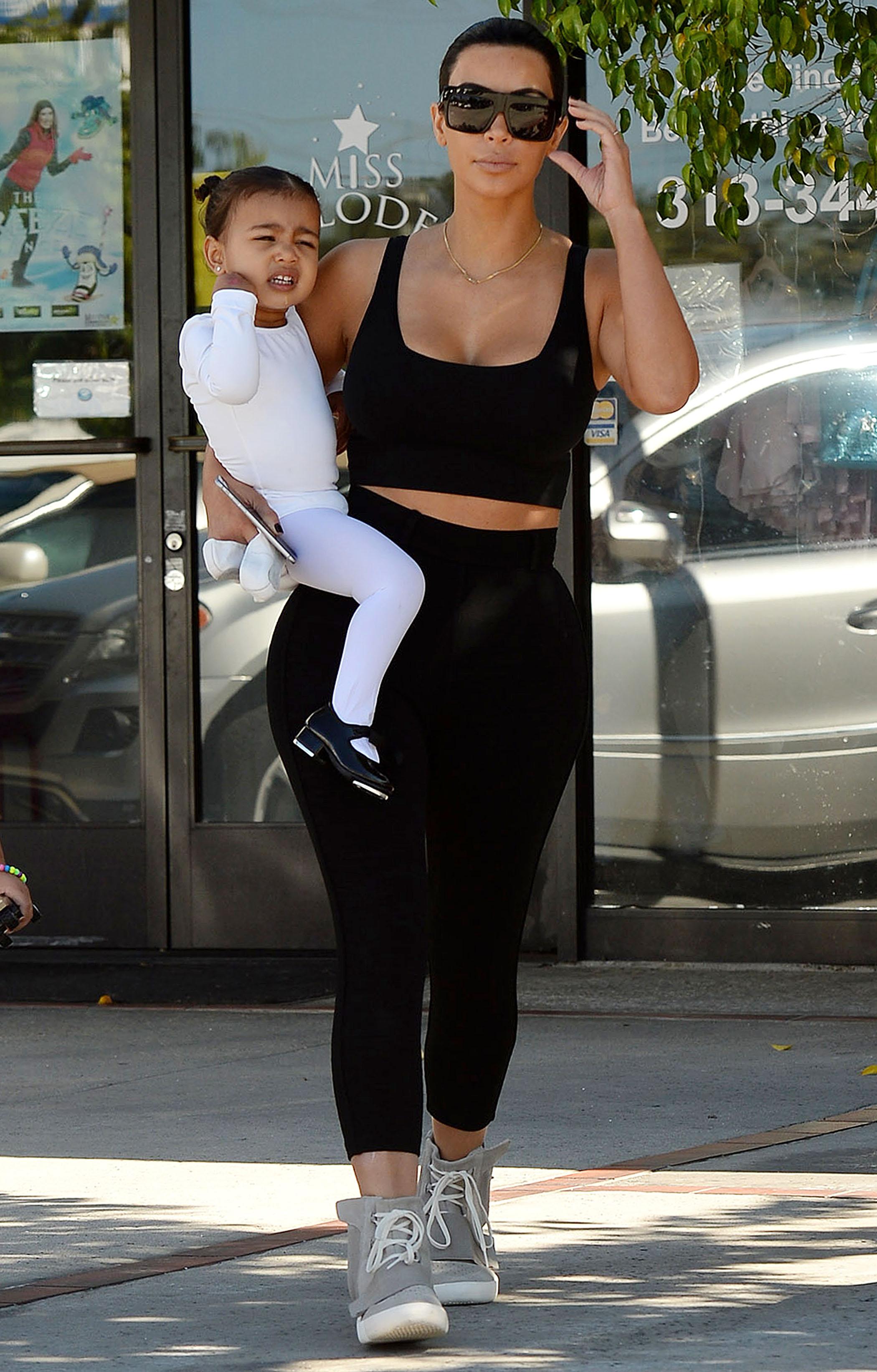 Kim Kardashian and Kourtney Kardashian take the kids to tap dance and ballet dance class in Tarzana **NO DAILY MAIL SALES**