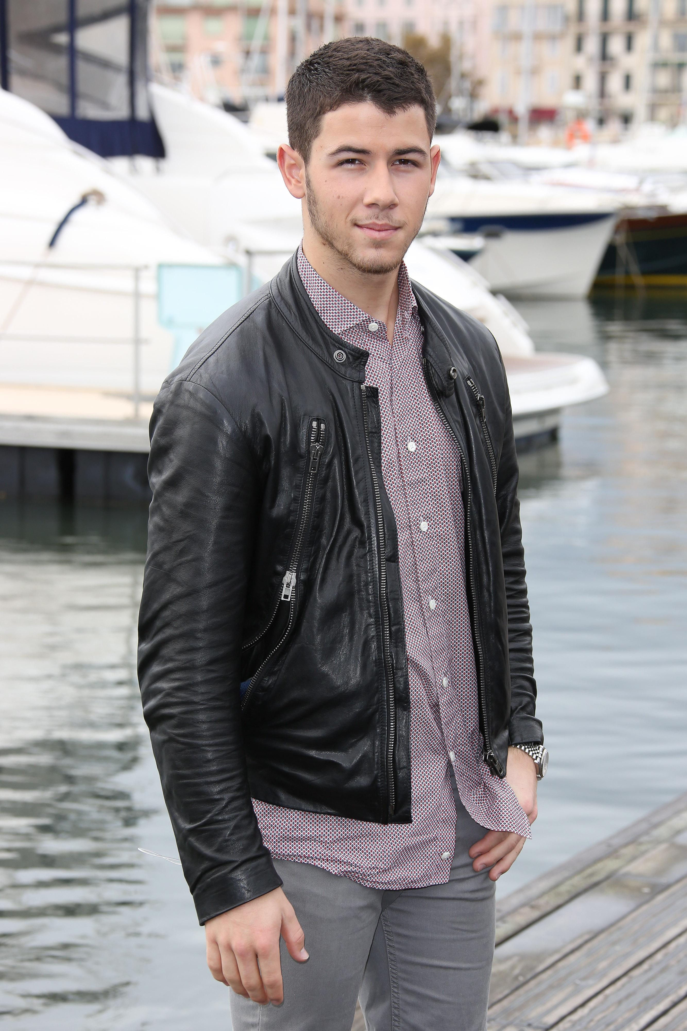 Nick Jonas poses by the harbour during a photocall for TV series &#039;Kingdom&#039; in Cannes