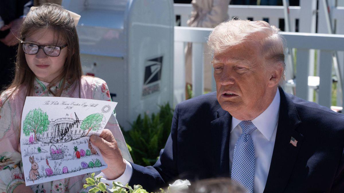 Image of While signing drawings, he joked that signed ones could sell online.