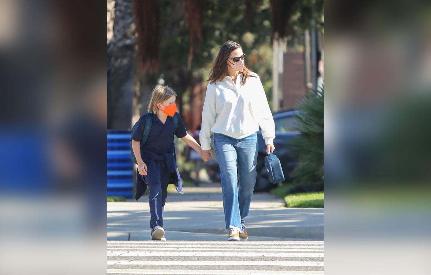 jennifer garner picks up son samuel from school while romance john miller gets serious