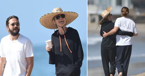 heidi klum and tom kaulitz enjoy a romantic walk on the beach
